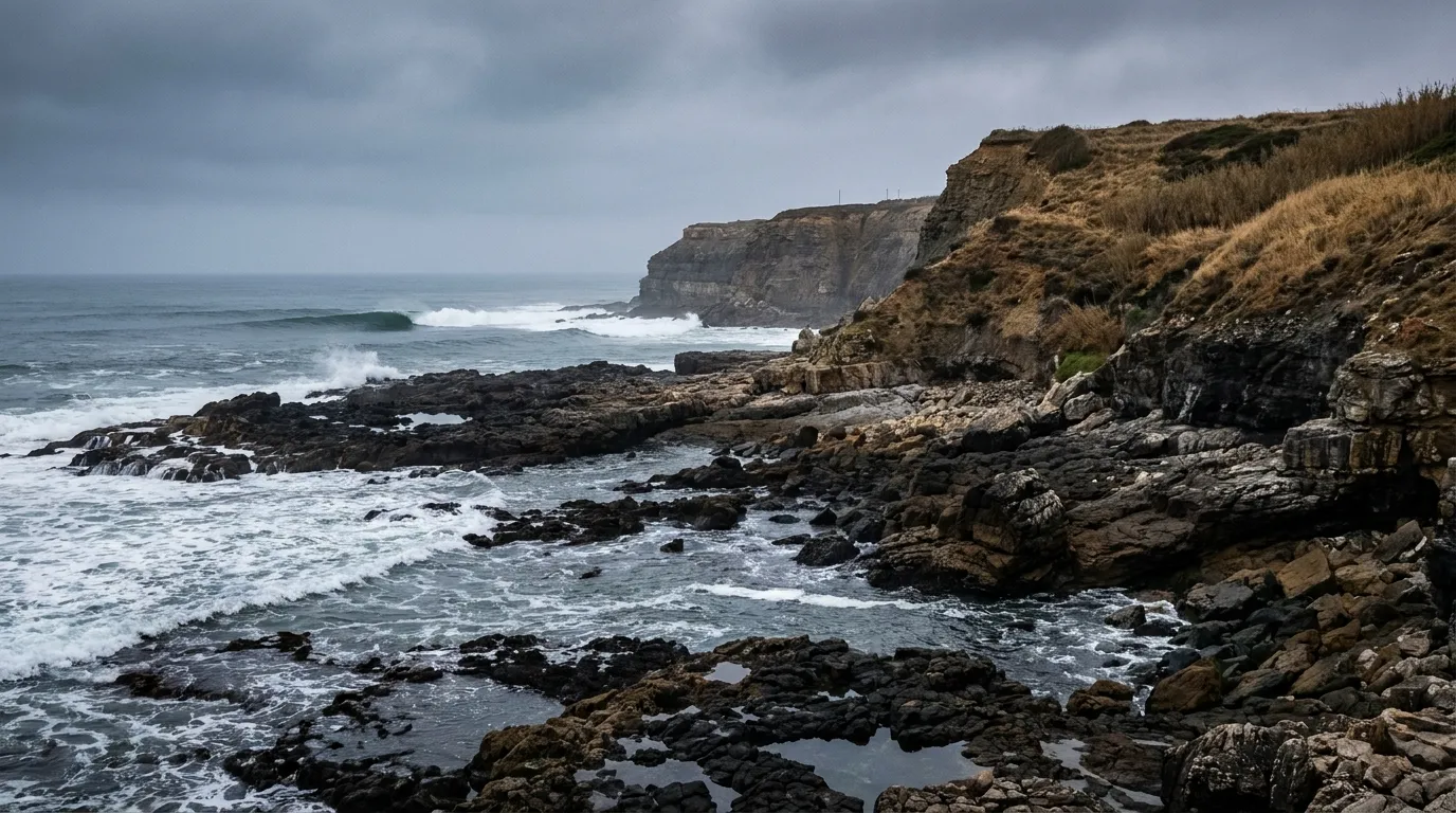 The reef and cliffs north of Ericeira on an overcast morning
